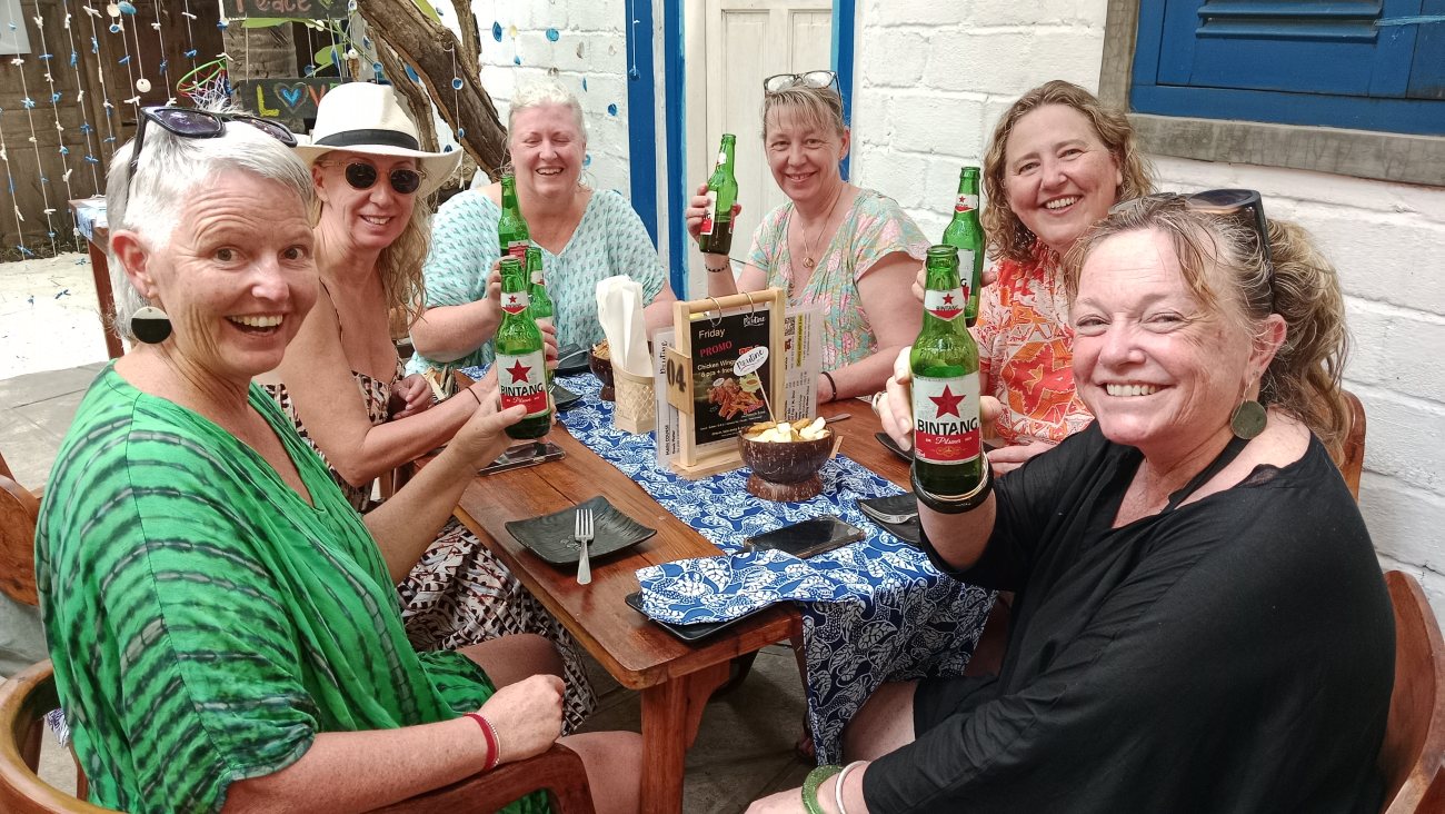 Guests sharing a table at Poutine Gili Air